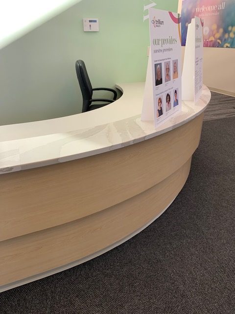 Trillium Health front desk by Solid Surfaces