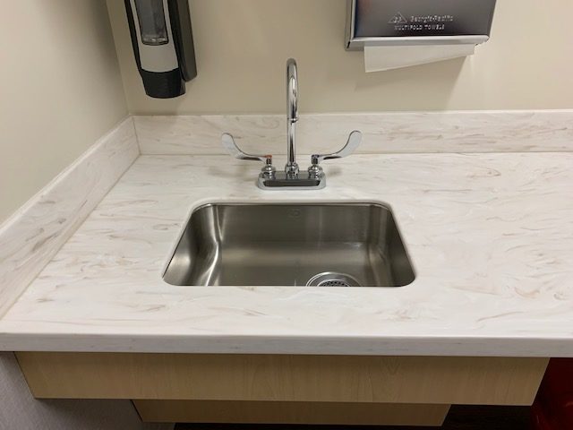 Hand washing sink for Trillium Health by Solid Surfaces
